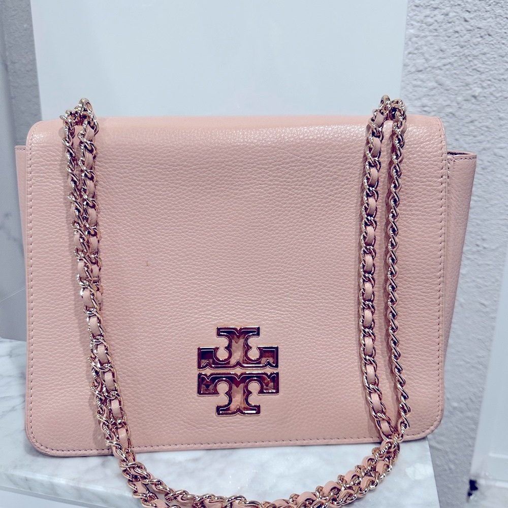 Priced to sell! can be worn as crossbody or shoulder bag. Very gently worn.